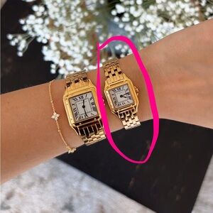 Gold Watch with White Roman Numeral Dial